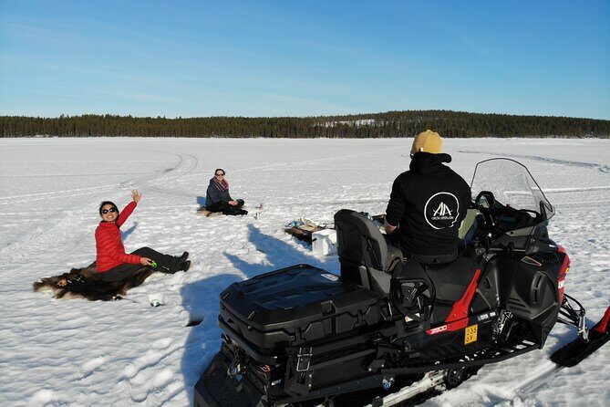 3 Days Raid Snowmobile in Finnish Lapland - Day 2 in Seipäjärvi: Ice Fishing Options, Frozen-Lake Bath, and Sauna