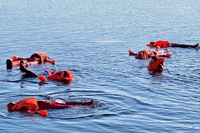 Arctic Ice floating in Puumala - The Waterfront Moment: Safety, Cold Reality, and How the Suit Helps