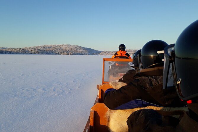From Ivalo: Ice Fishing Safari to Lake Inari, reindeers & lunch - Getting there the easy way: minibus, warm layers, and the sleigh ride