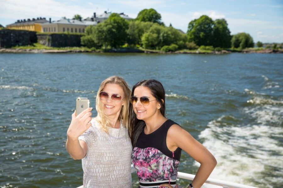 Helsinki: Hop-On Hop-Off Bus Tour & City Highlights Cruise - Along the route you might repeat: Olympic Stadium and Old Market Hall