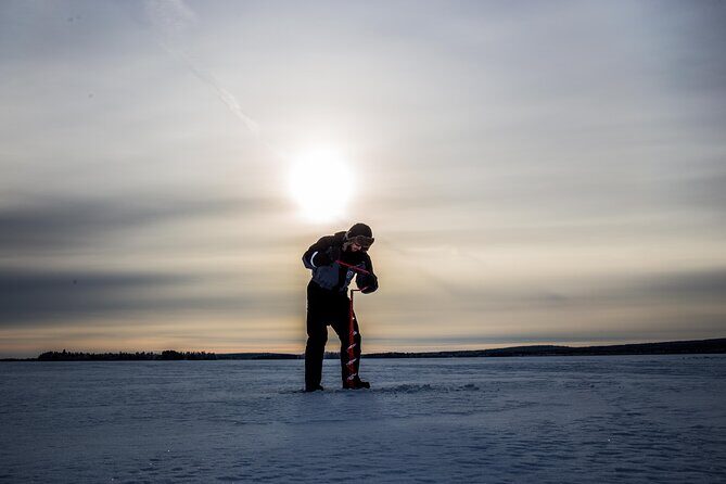 Ice Fishing on a Frozen Lake in Levi - Drilling the hole and learning the method (the part you remember)