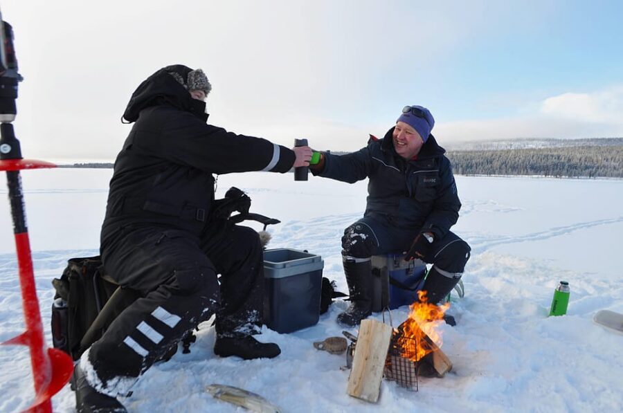 Ice fishing program in Lapland - Learning to Make a Hole in Thick Ice (and What You’ll Do With It)