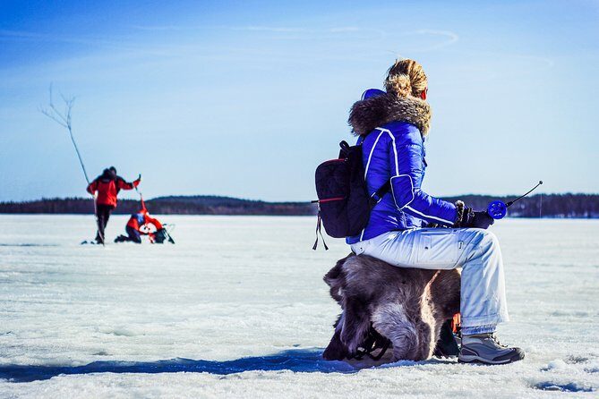 Ice Fishing Trip in Rovaniemi - Campfire lunch on the ice: warmth, snacks, and a simple meal break