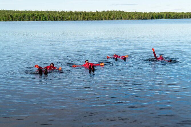 Midnight Sun Floating Experience in Forest Lake - The floating survival suit: safety, sizing, and first moments