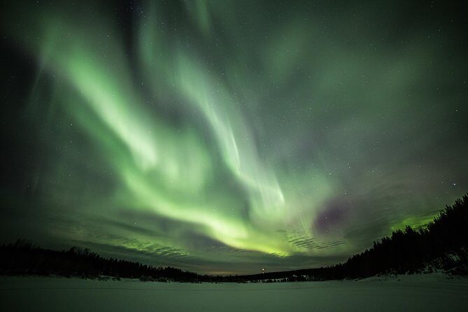 Northern Lights Hunt from Rovaniemi with Folk Tales and Snacks over Campfire - From Hotel Pickup to the Dark Spot Outside Rovaniemi