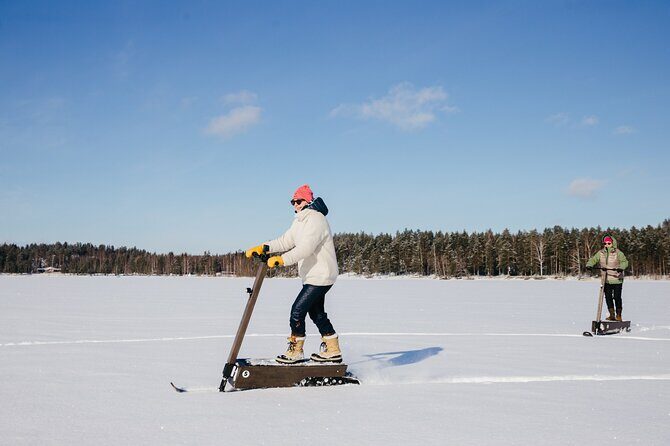 Private Driving Snow Scooters Experience in Finland - The eLyly electric snow scooter: easy to start, fun to master