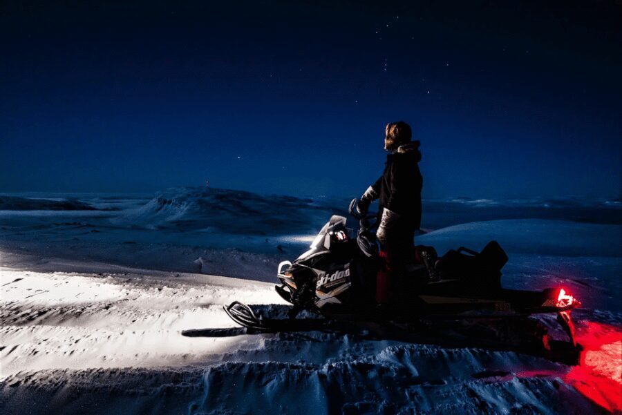 Rovaniemi: Northern Lights Snowmobile Safari with Campfire - Gear-up in thermal overalls: the quiet difference between fun and misery