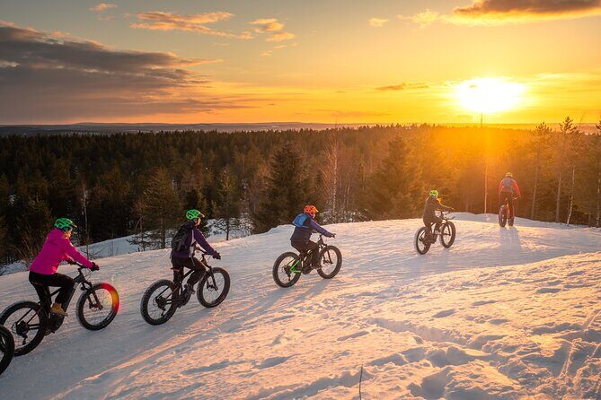 Scenic electric fat bike group ride in Rovaniemi - Tottorakka lift station: the steep last effort for top-of-hill views