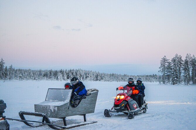 Small-Group Snowmobile Experience in Rovaniemi - Warm Up by the Bonfire: Sausages, Warm Juice, and Lapland Stories