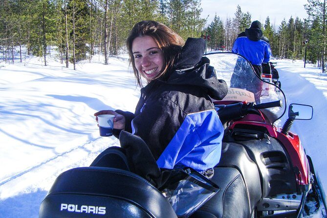 Snowmobile Safari in the Forest - Lunch by open fire: warm fuel in a Lapland hut