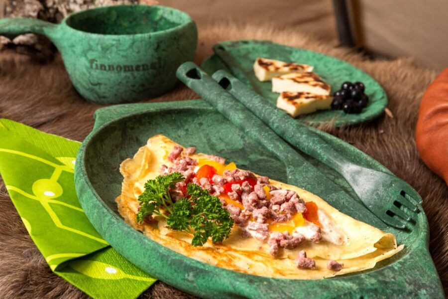 Ylläs: Fireside tasting in a traditional lavvo - The Food: Smoked Reindeer Pancakes, Fire-Brewed Glögi, and Squeaky Cheese