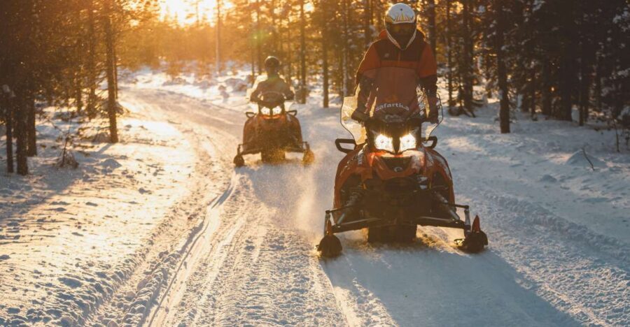 Ylläs: Snowmobile Tour to Arctic Snow Village & Snack - Transfers, Duration, and Value for $228 per Person